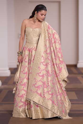 Safaa_Ivory Vegan Silk Tassels Sweetheart Neck Gulaabi Corset Lehenga Set _at_Aza_Fashions