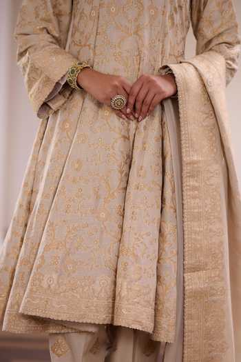 Safaa Ivory Vegan Silk, Shantoon Keyhole Neck Misri Mawa Floral Woven Anarkali Set at Aza Fashions Safaa_Ivory Vegan Silk, Shantoon Keyhole Neck Misri Mawa Floral Woven Anarkali Set _at_Aza_Fashions