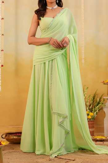 Shop B'Infinite Green Pastel Ruffle Embellished Draped Saree With Blouse For Kids Shop_B'Infinite_Green Pastel Ruffle Embellished Draped Saree With Blouse For Kids