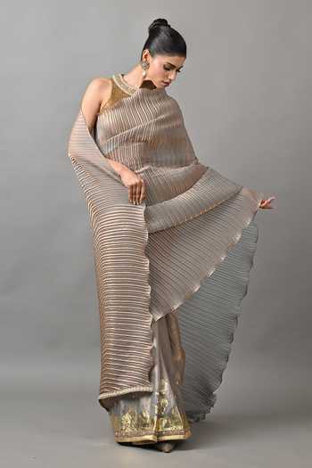 Shop Kiran Uttam Ghosh Gold Polyester Smoky Pleated Saree With Unstitched Blouse Piece Online at Aza Fashions Shop_Kiran Uttam Ghosh_Gold Polyester Smoky Pleated Saree With Unstitched Blouse Piece _Online_at_Aza_Fashions
