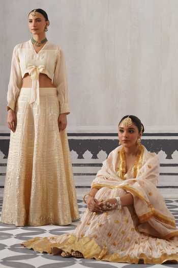 Shop Palak & Mehak Cream Organza, Chanderi V-neck Koyal Cropped Blouse And Lehenga Set Online at Aza Fashions Shop_Palak & Mehak_Cream Organza, Chanderi V-neck Koyal Cropped Blouse And Lehenga Set _Online_at_Aza_Fashions