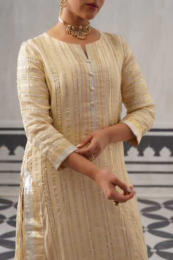 Palak & Mehak Cream Chanderi V-neck Kimi Gota Work Kurta Set at Aza Fashions Palak & Mehak_Cream Chanderi V-neck Kimi Gota Work Kurta Set _at_Aza_Fashions