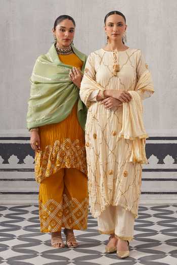Palak & Mehak_Yellow Chanderi Round Neck Rasna Border Embellished Kurta Set _Online_at_Aza_Fashions