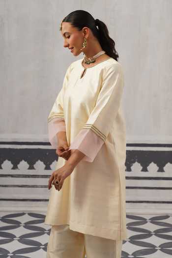 Shop Palak & Mehak Cream Dupion, Silk Keyhole Neck, Yes Straight Kurta And Pant Set Online at Aza Fashions Shop_Palak & Mehak_Cream Dupion, Silk Keyhole Neck, Yes Straight Kurta And Pant Set _Online_at_Aza_Fashions