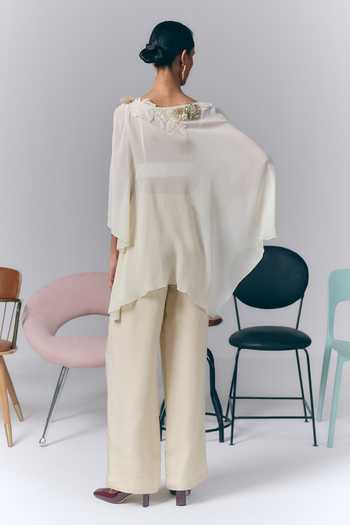 Shop Varun Bahl Ivory Georgette Asymmetric Neck Embellished Kaftan And Pant Set at Aza Fashions Shop_Varun Bahl_Ivory Georgette Asymmetric Neck Embellished Kaftan And Pant Set _at_Aza_Fashions