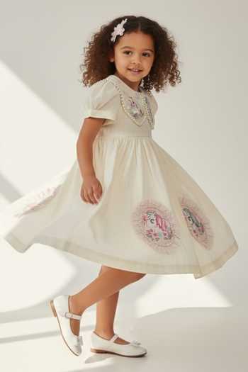 Buy Pooja Wang Ivory Cotton Unicorn Embroidered Dress Online at Aza Fashions Buy_Pooja Wang_Ivory Cotton Unicorn Embroidered Dress _Online_at_Aza_Fashions