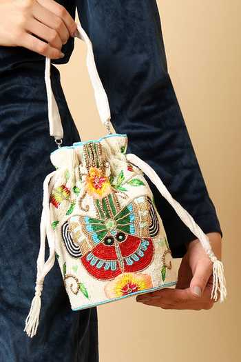 Buy House of Webhin White Embroidery, Beads, Pearls, Tassels Parwana Butterfly Motif Potli Online at Aza Fashions Buy_House of Webhin_White Embroidery, Beads, Pearls, Tassels Parwana Butterfly Motif Potli _Online_at_Aza_Fashions