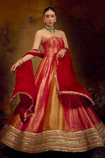Muskann Kapadiaa Multi Color Brocade Tassels Bandeau Neck Surya Banarasi Lehenga Corset Set at Aza Fashions Muskann Kapadiaa_Multi Color Brocade Tassels Bandeau Neck Surya Banarasi Lehenga Corset Set _at_Aza_Fashions