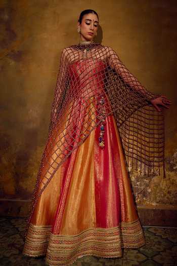 Shop Muskann Kapadiaa Multi Color Brocade Tassels Bandeau Neck Surya Banarasi Lehenga Corset Set Shop_Muskann Kapadiaa_Multi Color Brocade Tassels Bandeau Neck Surya Banarasi Lehenga Corset Set