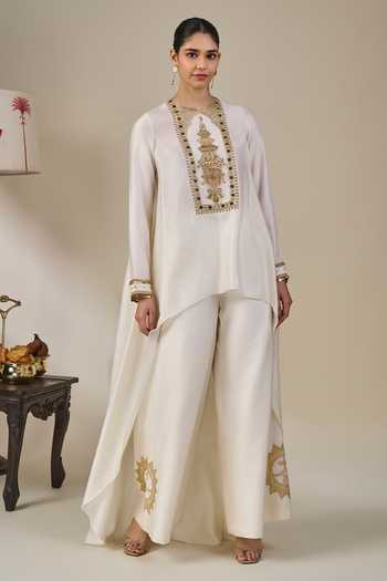 Masaba_Ivory Viscose Round Neck Kathakali Tales Asymmetric Kurta And Pant Set _at_Aza_Fashions