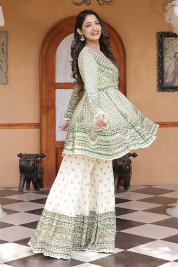 Surkh Syahi_Ivory Crepe Round Neck Printed Peplum Kurta And Sharara Set _Online_at_Aza_Fashions