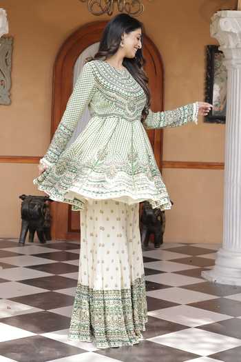 Buy_Surkh Syahi_Ivory Crepe Round Neck Printed Peplum Kurta And Sharara Set _Online_at_Aza_Fashions