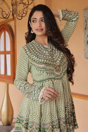 Surkh Syahi_Ivory Crepe Round Neck Printed Peplum Kurta And Sharara Set _at_Aza_Fashions