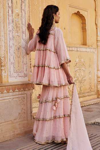 Shop Preevin Pink Organza, Chanderi Silk Boat Neck Tiered Peplum Kurta Sharara Set at Aza Fashions Shop_Preevin_Pink Organza, Chanderi Silk Boat Neck Tiered Peplum Kurta Sharara Set _at_Aza_Fashions