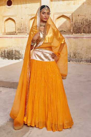 Shop Preevin Gold Organza, Chanderi Silk V-neck Zari Mukaish Work Lehenga Set Online at Aza Fashions Shop_Preevin_Gold Organza, Chanderi Silk V-neck Zari Mukaish Work Lehenga Set _Online_at_Aza_Fashions