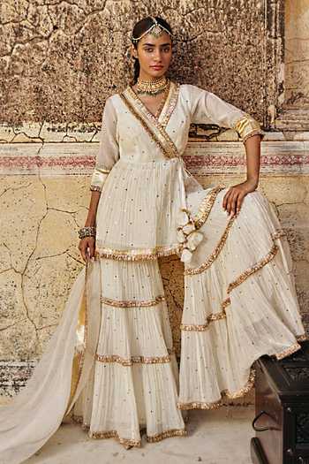 Buy Preevin Ivory Organza, Chanderi Silk V-neck, Yes Embroidered Peplum Kurta Set Online at Aza Fashions Buy_Preevin_Ivory Organza, Chanderi Silk V-neck, Yes Embroidered Peplum Kurta Set _Online_at_Aza_Fashions