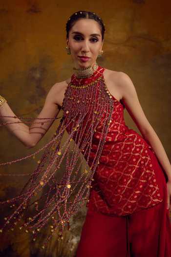 Muskann Kapadiaa_Red Halter Neck Jwala Tassel Embellished Top And Palazzo Set _at_Aza_Fashions