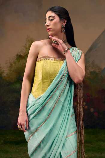 Muskann Kapadiaa_Blue Chiffon, Brocade Bandeau Neck Sindhu Pre-draped Saree And Corset Set _Online_at_Aza_Fashions