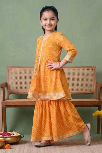 Buy Petite Pomme Orange Cotton Bandhani Print Kurta And Gharara Set Online at Aza Fashions Buy_Petite Pomme_Orange Cotton Bandhani Print Kurta And Gharara Set _Online_at_Aza_Fashions