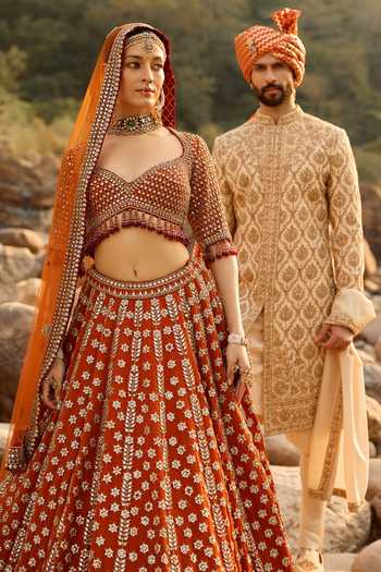 Buy Nitika Gujral Rust Silk, Net, Velvet Sweetheart Neck Amber Lehenga Set Online at Aza Fashions Buy_Nitika Gujral_Rust Silk, Net, Velvet Sweetheart Neck Amber Lehenga Set _Online_at_Aza_Fashions