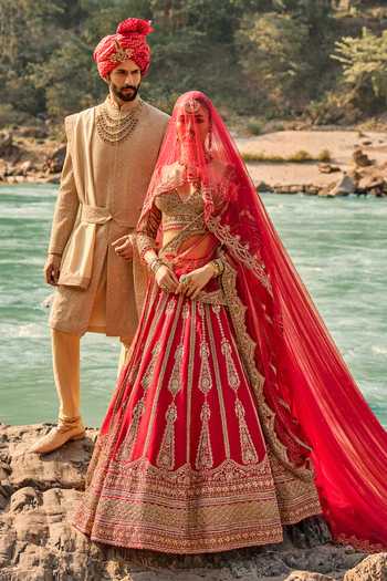 Shop Nitika Gujral Red Silk, Net Sweetheart Neck Regal Scarlet Bridal Lehenga Set Online at Aza Fashions Shop_Nitika Gujral_Red Silk, Net Sweetheart Neck Regal Scarlet Bridal Lehenga Set _Online_at_Aza_Fashions