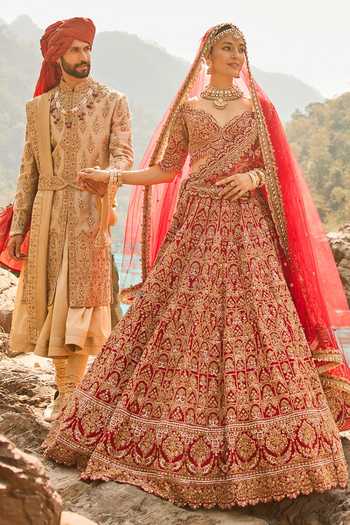 Shop Nitika Gujral Red Silk, Net Sweetheart Neck Flame Heritage Bridal Lehenga Set Online at Aza Fashions Shop_Nitika Gujral_Red Silk, Net Sweetheart Neck Flame Heritage Bridal Lehenga Set _Online_at_Aza_Fashions