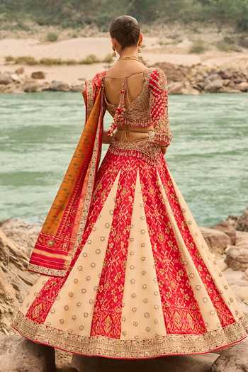 Shop Nitika Gujral Gold Silk, Tissue Sweetheart Neck Patola Legacy Lehenga Set at Aza Fashions Shop_Nitika Gujral_Gold Silk, Tissue Sweetheart Neck Patola Legacy Lehenga Set _at_Aza_Fashions
