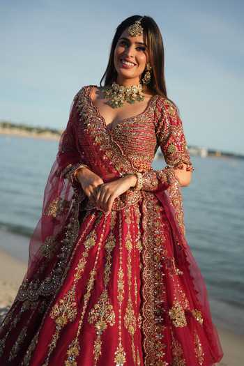 Buy_Nitika Gujral_Red Silk, Net Sweetheart Neck Crimson Heritage Bridal Lehenga Set _Online_at_Aza_Fashions