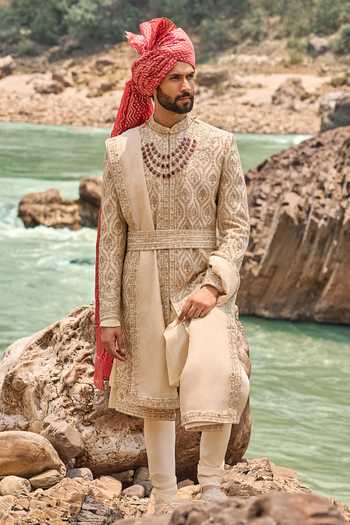 Buy Nitika Gujral Beige Silk, Cotton Floral Embroidered Sherwani Set at Aza Fashions Buy_Nitika Gujral_Beige Silk, Cotton Floral Embroidered Sherwani Set _at_Aza_Fashions