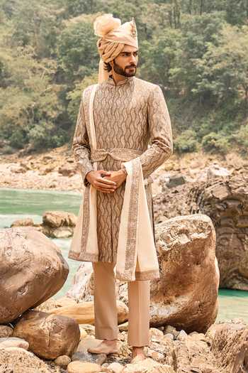 Buy Nitika Gujral Brown Silk, Cotton, Lycra Resham Work Sherwani Set at Aza Fashions Buy_Nitika Gujral_Brown Silk, Cotton, Lycra Resham Work Sherwani Set _at_Aza_Fashions