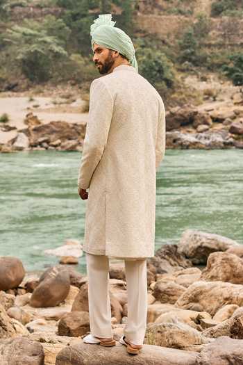 Shop Nitika Gujral Ivory Silk, Cotton, Lycra Jaal Sherwani Set at Aza Fashions Shop_Nitika Gujral_Ivory Silk, Cotton, Lycra Jaal Sherwani Set _at_Aza_Fashions