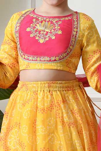Petite Pomme_Yellow Cotton, Net, Polyester Bandhani Print Lehenga Blouse Set _Online_at_Aza_Fashions