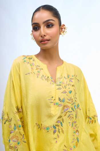 Shop Anamika Khanna Yellow V-neck Embroidered Top And Draped Skirt Set Online at Aza Fashions Shop_Anamika Khanna_Yellow V-neck Embroidered Top And Draped Skirt Set _Online_at_Aza_Fashions