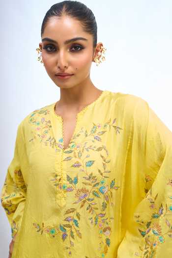 Anamika Khanna Yellow V-neck Embroidered Top And Draped Skirt Set at Aza Fashions Anamika Khanna_Yellow V-neck Embroidered Top And Draped Skirt Set _at_Aza_Fashions