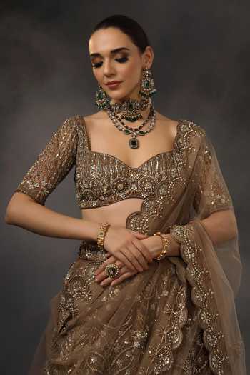 Miku Kumar_Brown Net Sweetheart Neck Nayika Embroidered Lehenga Set _at_Aza_Fashions
