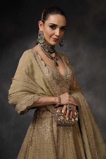 Miku Kumar_Gold Silk, Organza Sweetheart Neck Tisya Embroidered Lehenga Set _at_Aza_Fashions