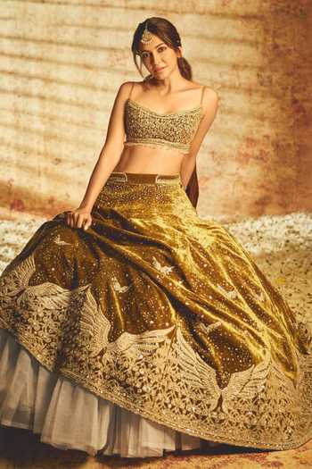 Buy MATSYA Yellow Velvet Sweetheart Neck Burnt Sunset Green Winged Lehenga Set Online at Aza Fashions Buy_MATSYA_Yellow Velvet Sweetheart Neck Burnt Sunset Green Winged Lehenga Set _Online_at_Aza_Fashions
