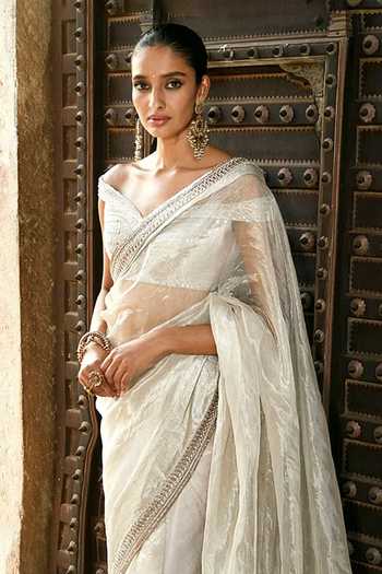 MATSYA Ivory Silk, Tissue Off-shoulder The Iconic Winged Blouse And Saree Set Online at Aza Fashions MATSYA_Ivory Silk, Tissue Off-shoulder The Iconic Winged Blouse And Saree Set _Online_at_Aza_Fashions