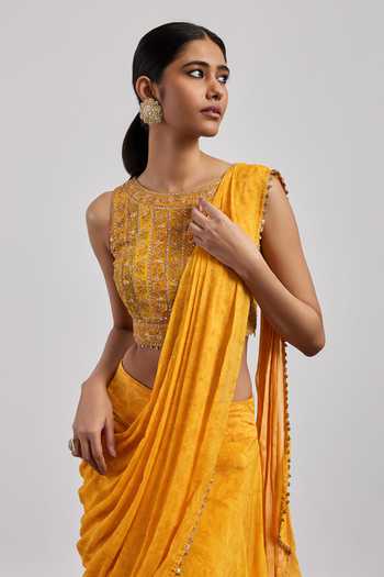 RI.Ritu Kumar Yellow Crepe, Viscose, Rayon Boat Neck Bougainvilla Pre-draped Saree With Blouse at Aza Fashions RI.Ritu Kumar_Yellow Crepe, Viscose, Rayon Boat Neck Bougainvilla Pre-draped Saree With Blouse _at_Aza_Fashions