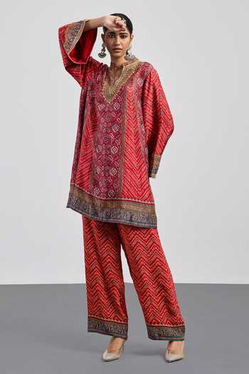 RI.Ritu Kumar Red Silk, Rayon, Crepe V-neck Ajrakh Print Kurta And Pant Set at Aza Fashions RI.Ritu Kumar_Red Silk, Rayon, Crepe V-neck Ajrakh Print Kurta And Pant Set _at_Aza_Fashions