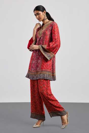 Buy RI.Ritu Kumar Red Silk, Rayon, Crepe V-neck Ajrakh Print Kurta And Pant Set Buy_RI.Ritu Kumar_Red Silk, Rayon, Crepe V-neck Ajrakh Print Kurta And Pant Set