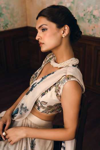 Paulmi And Harsh Ivory Chinon, Chiffon V-neck Wolfe Printed Pre-draped Saree With Blouse Online at Aza Fashions Paulmi And Harsh_Ivory Chinon, Chiffon V-neck Wolfe Printed Pre-draped Saree With Blouse _Online_at_Aza_Fashions