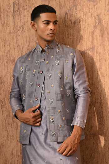 Sulakshna Jasra_Grey Satin, Linen Embroidered Nehru Jacket Set _at_Aza_Fashions