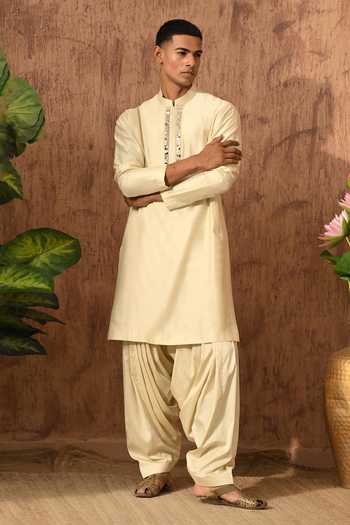 Sulakshna Jasra_Beige Silk, Cotton, Viscose Kurta Set _at_Aza_Fashions