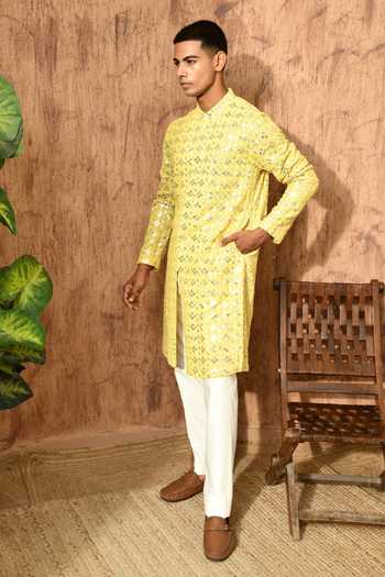 Sulakshna Jasra_Yellow Cotton, Georgette Embroidered Kurta And Pyjama Set _at_Aza_Fashions