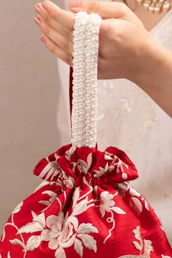 Buy AMYRA Red Embroidery, Beads, Pearls, Tassels Bulbul Potli Online at Aza Fashions Buy_AMYRA_Red Embroidery, Beads, Pearls, Tassels Bulbul Potli _Online_at_Aza_Fashions