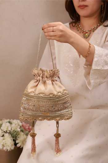AMYRA Beige Beads, Tassels, Gota Patti, Lace, Metallic Mrida Brocade Woven Potli Online at Aza Fashions AMYRA_Beige Beads, Tassels, Gota Patti, Lace, Metallic Mrida Brocade Woven Potli _Online_at_Aza_Fashions