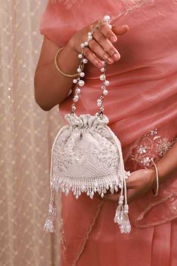 Buy AMYRA Silver Embroidery, Beads, Pearls, Crystals, Tassels, Lace, Sehra Mini Potli Buy_AMYRA_Silver Embroidery, Beads, Pearls, Crystals, Tassels, Lace, Sehra Mini Potli