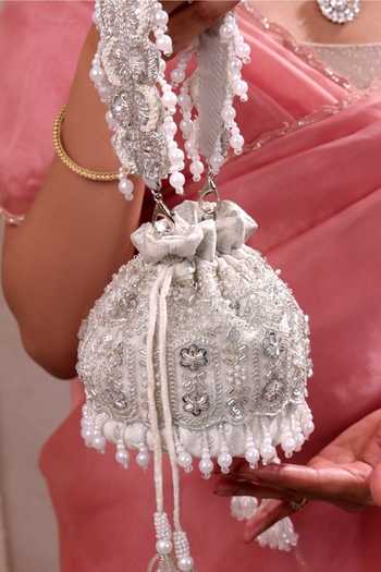 Buy AMYRA Silver Embroidery, Beads, Pearls, Tassels Lumia Mini Potli Online at Aza Fashions Buy_AMYRA_Silver Embroidery, Beads, Pearls, Tassels Lumia Mini Potli _Online_at_Aza_Fashions