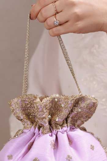 Buy AMYRA Purple Embroidery, Beads, Crystals, Tassels Azai Potli Online at Aza Fashions Buy_AMYRA_Purple Embroidery, Beads, Crystals, Tassels Azai Potli _Online_at_Aza_Fashions